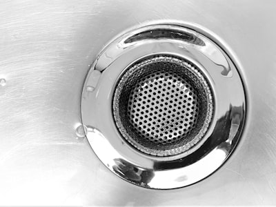 Sink drain cleaning and repair